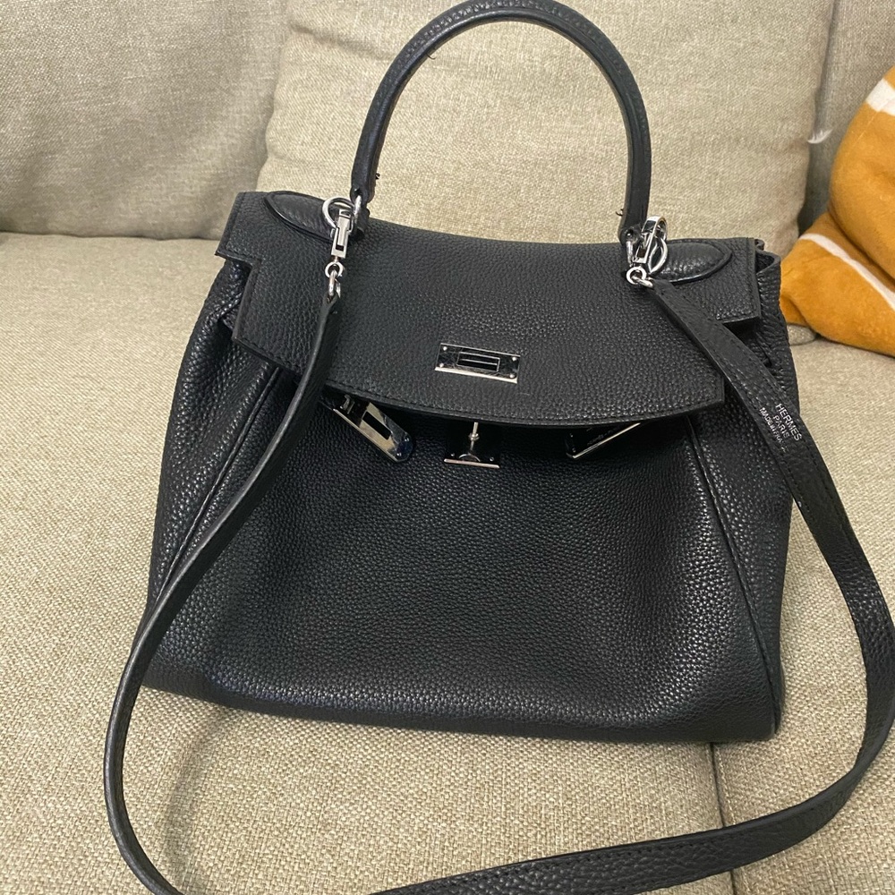 Hermes Kelly Style bag. It’s a gorgeous, quality leather handbag.